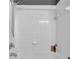 Updated bathroom with modern tile shower, new shower head and bath accessories at 7070 Opal Dr, Largo, FL 33773