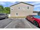 Apartment building exterior showing parking spaces, well-maintained property, and accessible parking at 7070 Opal Dr, Largo, FL 33773