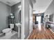 Open concept with living room, kitchen, and half bath at 7070 Opal Dr, Largo, FL 33773