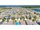 Aerial view of the property in a community setting, showcasing the home's location and neighborhood layout at 7236 Salt River Ave, Sun City Center, FL 33573