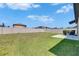 Spacious backyard with a patio area and privacy fence, offering a great outdoor space for relaxation and entertaining at 7236 Salt River Ave, Sun City Center, FL 33573
