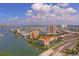 Stunning aerial of the waterfront community, highlighting its convenient location, and lush landscaping at 7465 Bay Island S Dr # 211, South Pasadena, FL 33707