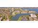 Scenic aerial view of waterfront community with lush landscaping and easy access to the bay at 7465 Bay Island S Dr # 211, South Pasadena, FL 33707