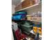 Organized storage closet with shelves holding household supplies and storage containers at 7465 Bay Island S Dr # 211, South Pasadena, FL 33707