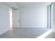 Bright bedroom with white walls, tile floors, and a large window providing natural light at 777 3Rd N Ave # 1308, St Petersburg, FL 33701