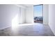 Bright bedroom featuring a large window offering city views and plenty of natural light at 777 3Rd N Ave # 1308, St Petersburg, FL 33701