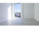 Bright room features a large window with scenic city views, and neutral tile floors at 777 3Rd N Ave # 1308, St Petersburg, FL 33701