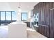 Modern kitchen with stainless steel appliances, island with counter seating, and ample storage at 777 3Rd N Ave # 1308, St Petersburg, FL 33701