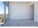 Bright living room featuring large windows and modern tile flooring at 777 3Rd N Ave # 1501, St Petersburg, FL 33701