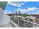 Condo balcony overlooking the city skyline, including a lake, various buildings and some new construction at 777 3Rd N Ave # 707, St Petersburg, FL 33701