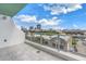 Enjoy panoramic views of the city skyline from this residence's spacious balcony with a modern glass railing at 777 3Rd N Ave # 707, St Petersburg, FL 33701