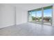 Bright living room with expansive windows offering city views and modern flooring at 777 3Rd N Ave # 707, St Petersburg, FL 33701