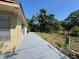 Outdoor space with a concrete patio and ample yard, perfect for outdoor entertaining and relaxation at 8718 Arrowhead Dr, Hudson, FL 34667