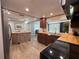 Bright, updated kitchen with wood cabinets, butcher block countertops, and stainless steel appliances at 8718 Arrowhead Dr, Hudson, FL 34667