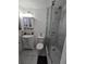 Practical bathroom with marble-tiled walk-in shower and a sleek, modern vanity at 111 Inwood Cir, Brandon, FL 33510