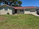 Charming single-story home with a well-maintained lawn and a cozy, inviting facade at 111 Inwood Cir, Brandon, FL 33510