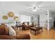 Inviting living room featuring hardwood floors, neutral decor, and comfortable seating at 111 Inwood Cir, Brandon, FL 33510