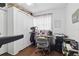 Functional office space with desk, storage, and exercise equipment at 111 Inwood Cir, Brandon, FL 33510