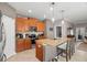Well-appointed kitchen with island seating, modern appliances, and seamless access to the living area at 11656 Lake Blvd, New Port Richey, FL 34655