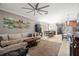 Spacious living room with plush seating, decor, and a view to the open concept layout at 11656 Lake Blvd, New Port Richey, FL 34655