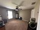Bedroom includes ceiling fan, carpet flooring and lots of space to customize as you see fit at 13416 Algoma Ave, Spring Hill, FL 34609