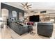 Inviting living area features stylish decor, a ceiling fan, and ample space for relaxation and entertainment at 13416 Algoma Ave, Spring Hill, FL 34609