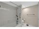 Bright bathroom features a tiled shower/tub combo with updated fixtures and neutral decor at 1460 Gulf Blvd # 1206, Clearwater Beach, FL 33767
