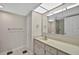Bathroom featuring a sink with a mirror and an enclosed shower at 1460 Gulf Blvd # 1206, Clearwater Beach, FL 33767