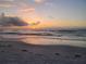 Beautiful beach view with clear water, reflecting the sunrise sky at 1460 Gulf Blvd # 1206, Clearwater Beach, FL 33767