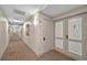 Hallway of condo building shows unit number and doors to individual units at 1460 Gulf Blvd # 1206, Clearwater Beach, FL 33767