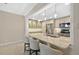 Updated kitchen with stainless appliances, granite countertops and breakfast bar with seating at 1460 Gulf Blvd # 1206, Clearwater Beach, FL 33767
