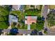 Aerial view of house featuring a tile roof, spacious backyard and a long driveway at 1469 S Hillcrest Ave, Clearwater, FL 33756