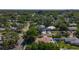 Enjoy neighborhood views from this aerial perspective, showing the surrounding homes and leafy streets at 1469 S Hillcrest Ave, Clearwater, FL 33756