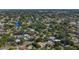 Aerial view of a lush residential neighborhood with mature trees and various home styles at 1469 S Hillcrest Ave, Clearwater, FL 33756