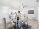 Dining room with seating and decor featuring an open floor plan to the kitchen and living area at 1469 S Hillcrest Ave, Clearwater, FL 33756