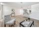 Spacious living area with hardwood floors, an open layout, and stylish furnishings at 1469 S Hillcrest Ave, Clearwater, FL 33756