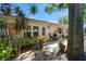 Inviting patio with outdoor seating and lush landscaping in the backyard at 1535 Nursery Rd # 111, Clearwater, FL 33756