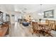 Inviting living room, seamlessly connecting to a dining area and sunlit sitting room through an open-concept layout at 1535 Nursery Rd # 111, Clearwater, FL 33756