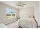 Bedroom featuring a bright window with neighborhood views at 16709 Barnwood Pl, Bradenton, FL 34211
