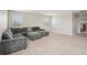 Bonus room with plush carpeting, natural light, and generous seating area at 16709 Barnwood Pl, Bradenton, FL 34211