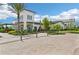 Inviting clubhouse exterior featuring well-manicured landscaping, striking architecture, and a welcoming entrance at 16709 Barnwood Pl, Bradenton, FL 34211