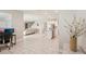 Spacious open concept living area with tile flooring and abundant natural light at 16709 Barnwood Pl, Bradenton, FL 34211