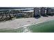 Breathtaking aerial view of a sandy beach near condos, perfect for coastal living and relaxation at 17960 Gulf Blvd # 104, Redington Shores, FL 33708