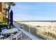 Charming patio with ocean views and outdoor seating, ideal for relaxing and entertaining near the beach at 17960 Gulf Blvd # 104, Redington Shores, FL 33708