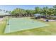 Community recreation area featuring basketball court and playground at 19139 Cypress Reach Ln, Tampa, FL 33647