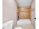 Bathroom featuring a white bathtub with tile surround and matching floors at 1969 Wolf Laurel Dr, Sun City Center, FL 33573