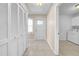 Entryway with tile flooring, a closet, and laundry room access at 1969 Wolf Laurel Dr, Sun City Center, FL 33573