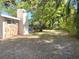 Expansive backyard with mature trees and ample space for recreation at 205 Park Ridge Ave, Temple Terrace, FL 33617