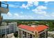 High-angle view featuring a city landscape, blue sky, and tree coverage at 2103 Bayshore Blvd # 1701, Tampa, FL 33606