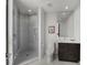 Sleek bathroom featuring a glass-enclosed shower, modern toilet, and dark wood vanity at 2103 Bayshore Blvd # 1701, Tampa, FL 33606